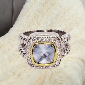 Light Blue CZ Ring with Dual Braided Band. Size 6. NWOT
